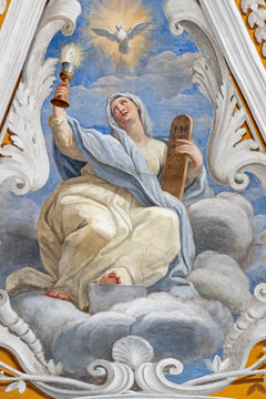 ACIREALE, ITALY - APRIL 11, 2018: The fresco of Faith cardinal virtue in church Chiesa di San Camillo by Pietro Paolo Vasta (1745 - 1750).
