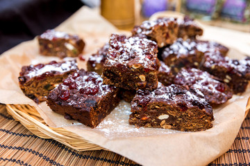 Vegan brownie with berries and nuts