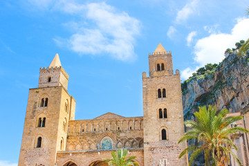 Fototapeta na wymiar Amazing view of historical Cefalu Cathedral in Italian Sicily. The famous Roman Catholic basilica was built in Norman architectural style. Popular tourist attraction