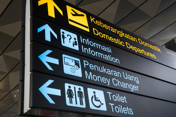 Information sign in English and Indonesian languages inside newly build Terminal 3 building of Soekarno–Hatta International Airport in Jakarta - 269889794