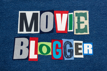 MOVIE BLOGGER text word collage colorful fabric on blue denim, movie and celebrity blogs and blogging, horizontal aspect