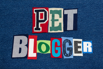 PET BLOGGER text word collage colorful fabric on blue denim, animals and pets blogs and blogging, horizontal aspect