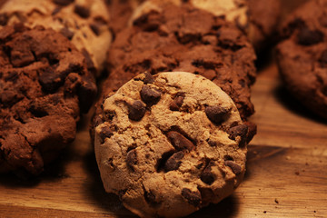 Chocolate cookies on wooden table. Chocolate chip cookies