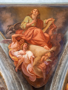 COMO, ITALY - MAY 8, 2015: The fresco of St. John the evangelist in church Basilica di San Fedele by Giovanni Valtorta  (1846).