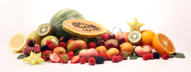 Fresh summer fruits with apple, peach, papaya, berries, pear and apricot.