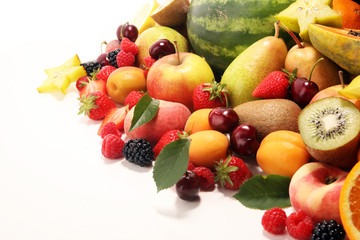 Fresh summer fruits with apple, peach, papaya, berries, pear and apricot.