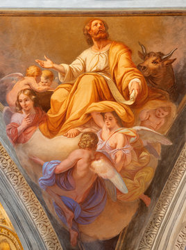 COMO, ITALY - MAY 8, 2015: The fresco of St. Luke the evangelist in church Basilica di San Fedele by Giovanni Valtorta  (1846).