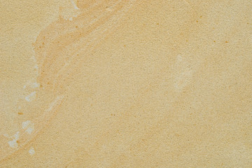 beige sandstone wall background texture
