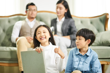 asian family having fun at home