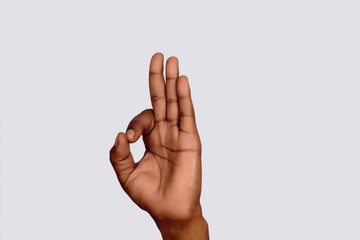 Hand with OK gesture.