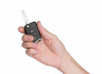 Hand holding car keys isolated