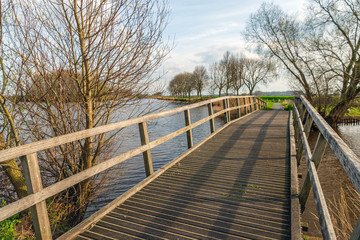 Large wooden footbridge over the water