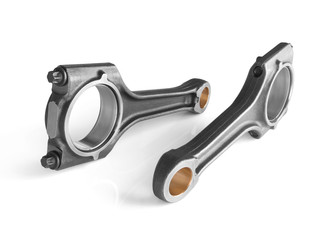 Connecting rod from a car engine isolated on white