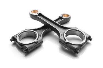 Connecting rod from a car engine isolated on white