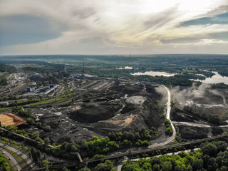 Industrial area with coal waste of metallurgical manufacturing, aerial drone photo