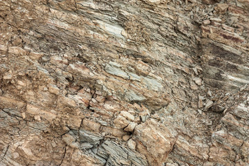 Layers of sedimentary rock formed on the earth's surface. Outcrops on the southern coast of the Azov sea. Taman Peninsula, Temryuk district, Krasnodar region, Russia