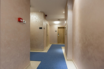 Hotel corridor with marble floor