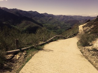 Mountain road that descends towards the valley. Route in Asturias Spain