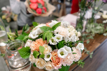 Master class on making bouquets. Summer bouquet. Learning flower arranging, making beautiful bouquets with your own hands. Flowers delivery