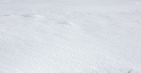 Fototapeta na wymiar Fragment of snow surface after snowstorm
