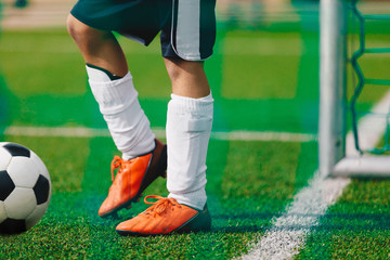 Adult Soccer Football Training Session. Football Player Practice with Ball on the Field