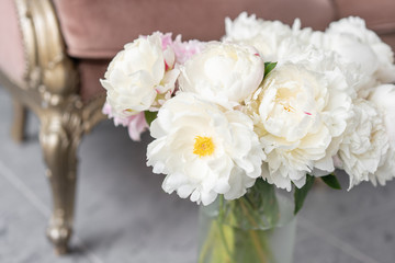 White peonies in a metal vase. Beautiful peony flower for catalog or online store. Floral shop concept . Beautiful fresh cut bouquet. Flowers delivery