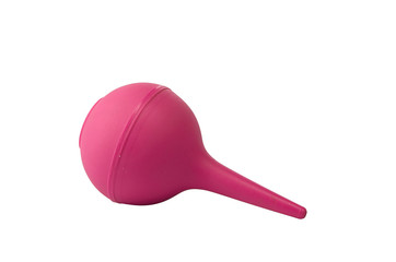 Lying on its side pink enema isolated on white