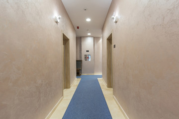 Hotel corridor with marble floor