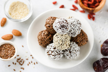 Chocolate protein energy balls with seeds, dates, nuts. Raw food, vegan, vegetarian diet, weight loss concept