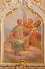 MENAGGIO, ITALY - MAY 8, 2015: The neobaroque fresco of St. Matthew the Evangelist in church chiesa di Santo Stefano by Luigi Tagliaferri (1841-1927).