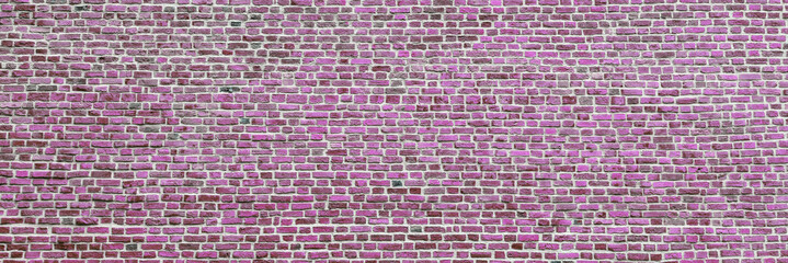 Brick wall, wide panorama of masonry. Wall with small Bricks