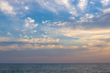 Amazing sea sunset, the sun, waves, clouds