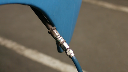 Part of subway train close up. Blue locomotive at the service station.