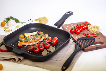 frying pan with tomatoes