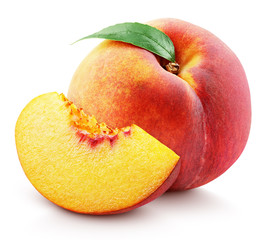 Ripe whole peach fruit with green leaf and slice isolated on white background with clipping path....