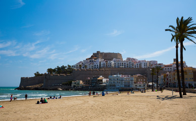 View of Peniscola buildings with beachside at sunny day, Spain