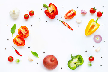 Various fresh vegetables and herbs on white. Healthy eating concept