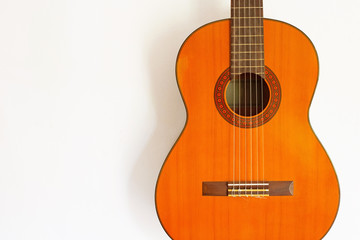 Obraz premium Classic guitar on white wall
