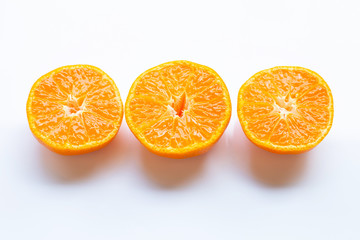 Fresh orange citrus fruit on white
