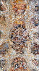 CATANIA, ITALY - APRIL 7, 2018: The vault fresco of Saint Benedict among the saints in church Chiesa di San Benedetto by Giovanni Tuccari (1667–1743).