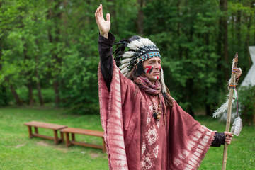 Native american indian, tribal leader in traditional indian clothes. Indian culture and history concept