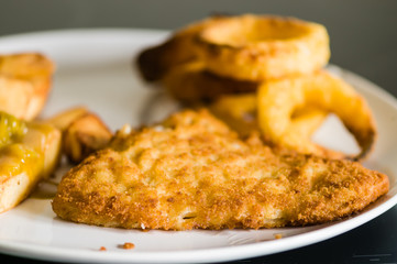 Gluten free breaded cod fish and chips with gluten free onion rings