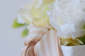 ribbon and rose at airy atmosphere