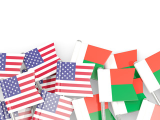 Fototapeta na wymiar Pins with flags of United States and madagascar isolated on white