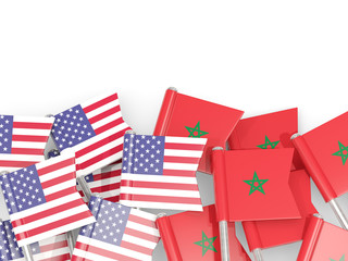 Fototapeta na wymiar Pins with flags of United States and morocco isolated on white