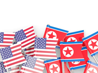 Fototapeta premium Pins with flags of United States and north korea isolated on white