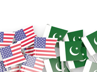 Pins with flags of United States and pakistan isolated on white