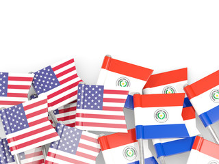 Pins with flags of United States and paraguay isolated on white