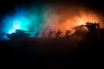 War Concept. Military silhouettes fighting scene on war fog sky background,