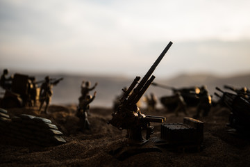 War Concept. Military silhouettes fighting scene on war fog sky background,